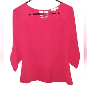 Skies are Blue red shirt with cutouts. Button on sleeve